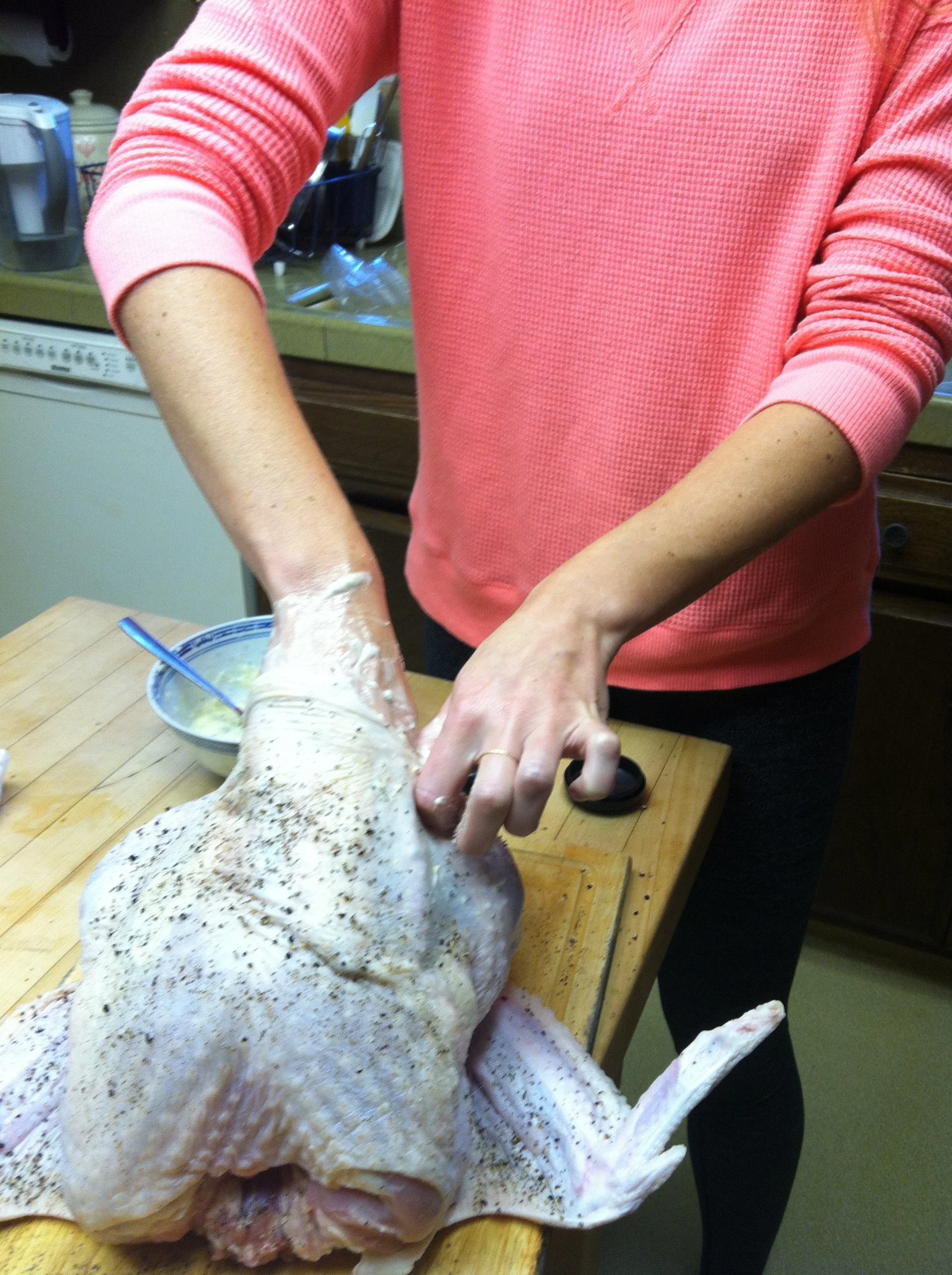 Get dirty! Butter under the skin helps keep it moist.