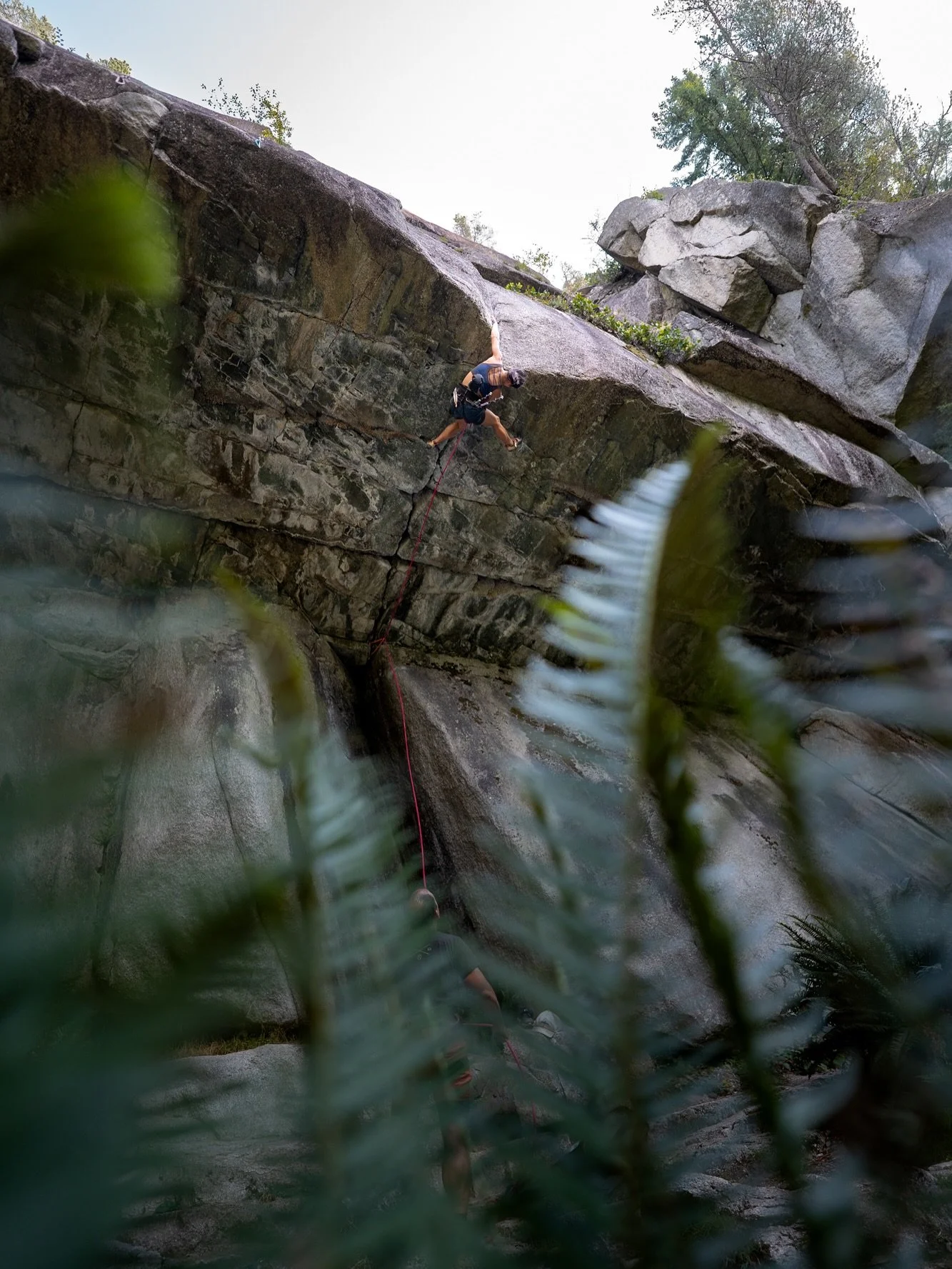 I first met Anna back in 2018 on a trip to Squamish, a few years before I ever called this place home. Fast forward to now, and here we are, she&rsquo;s hanging upside down on Zombie Roof, one of the most iconic single pitch trad routes in Squamish, 