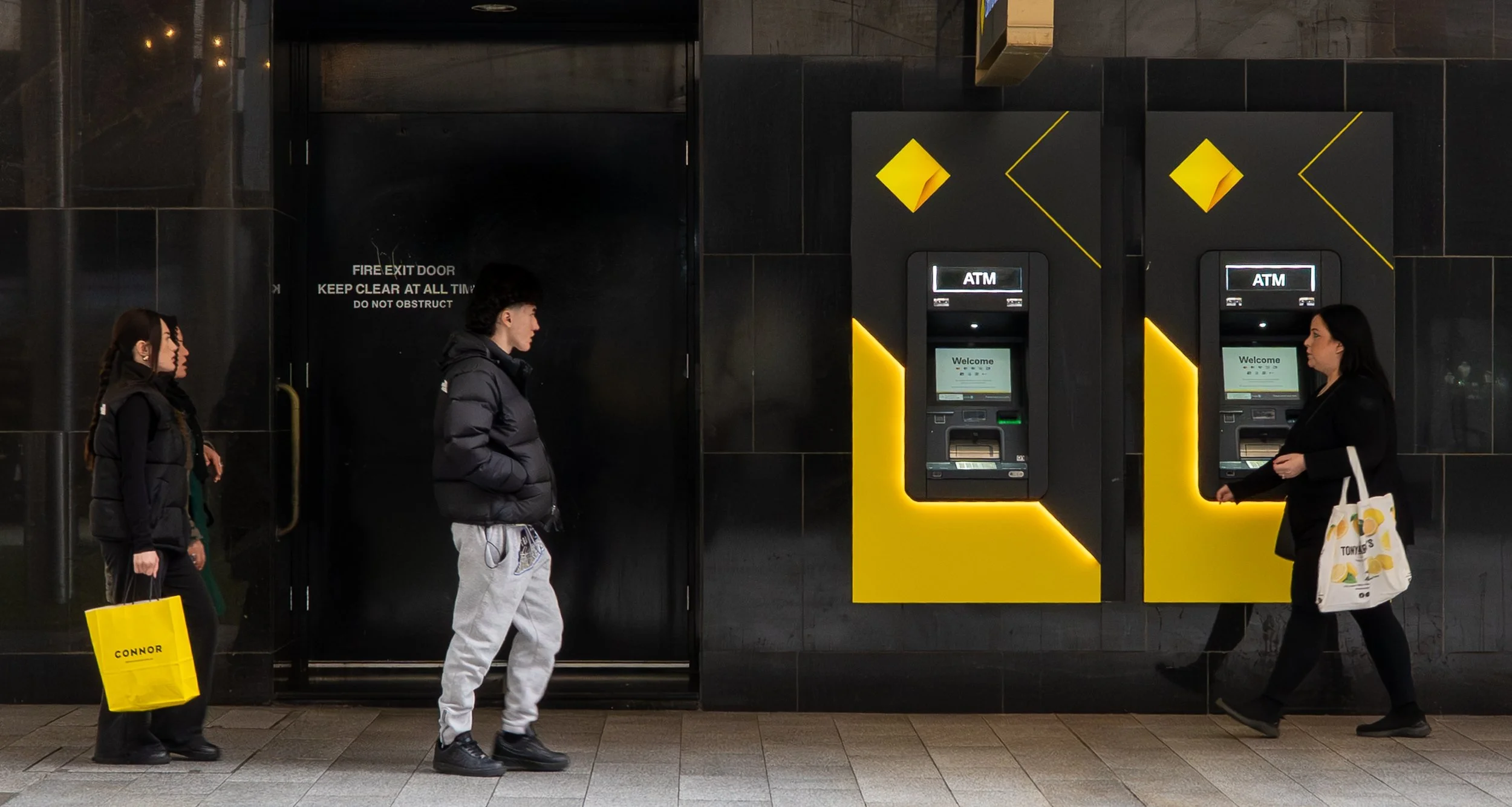 23 Judi Thies, AAPS Outside the ATM 04 Photojournalism - Street Photography Digital.jpg