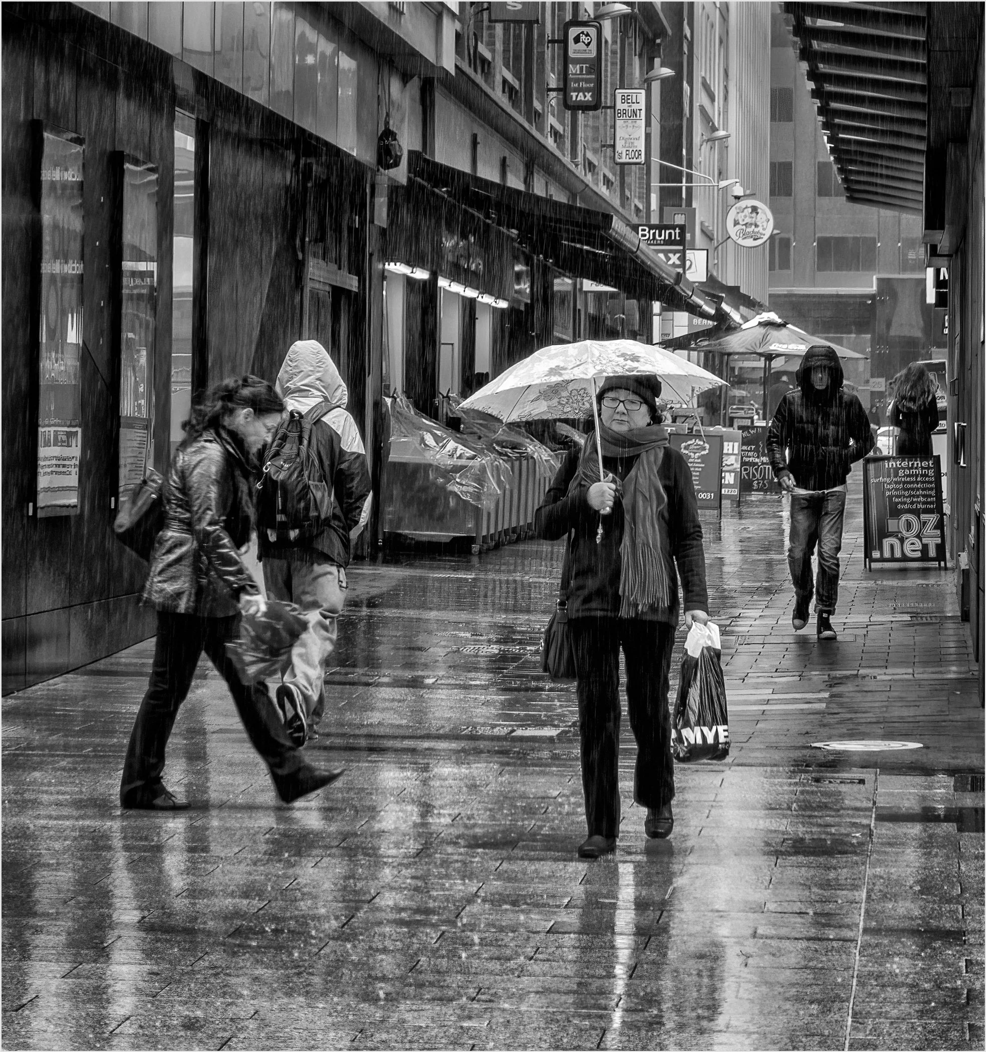 10~Brenda Jones, EFIAP FAPS~City showers~2026-10-06~Digital - Urban_Street_Suburban.jpg