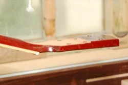 Headstock repair backstrap overlay technique