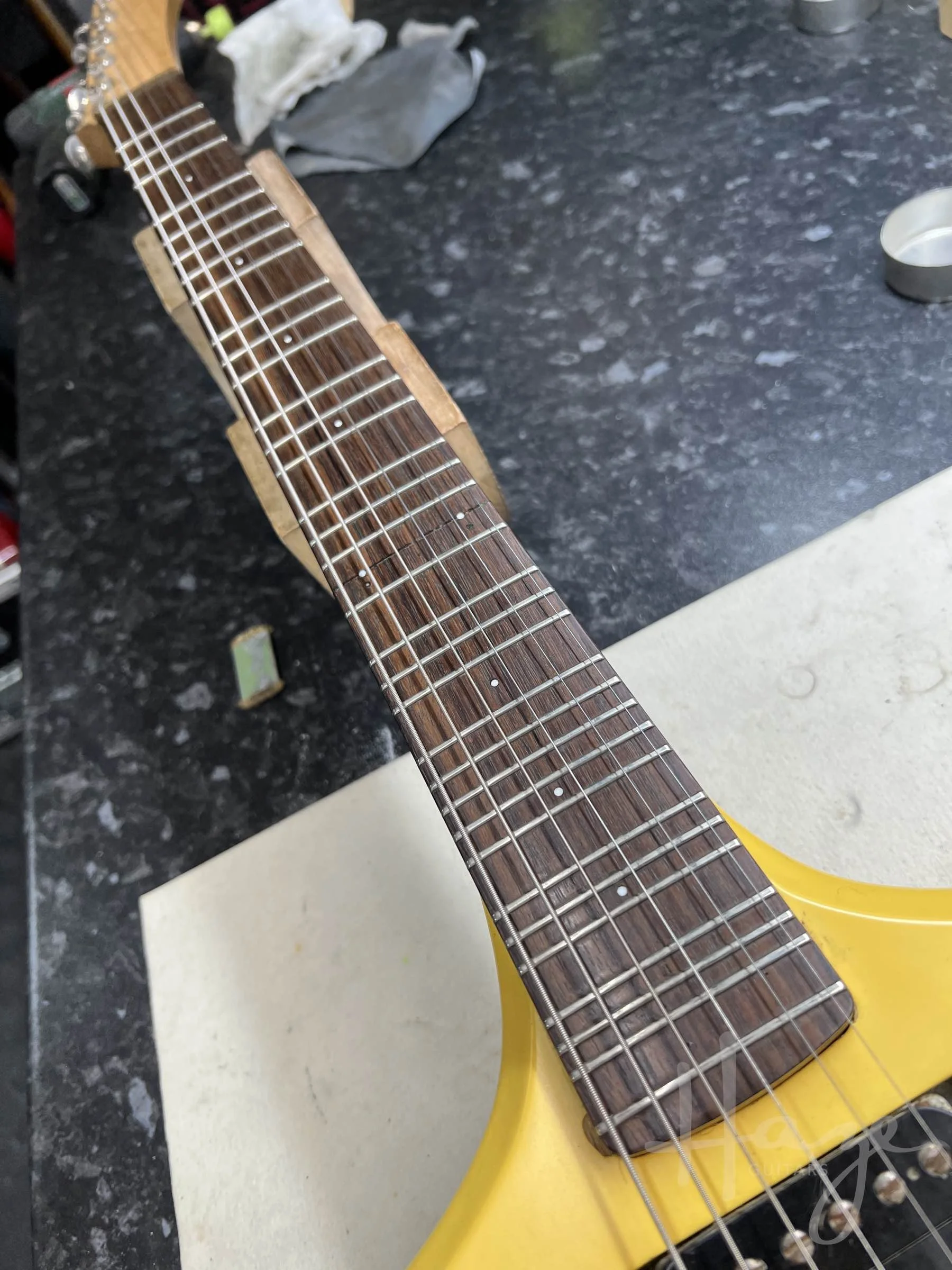 Microtonal guitar with additional fret positions