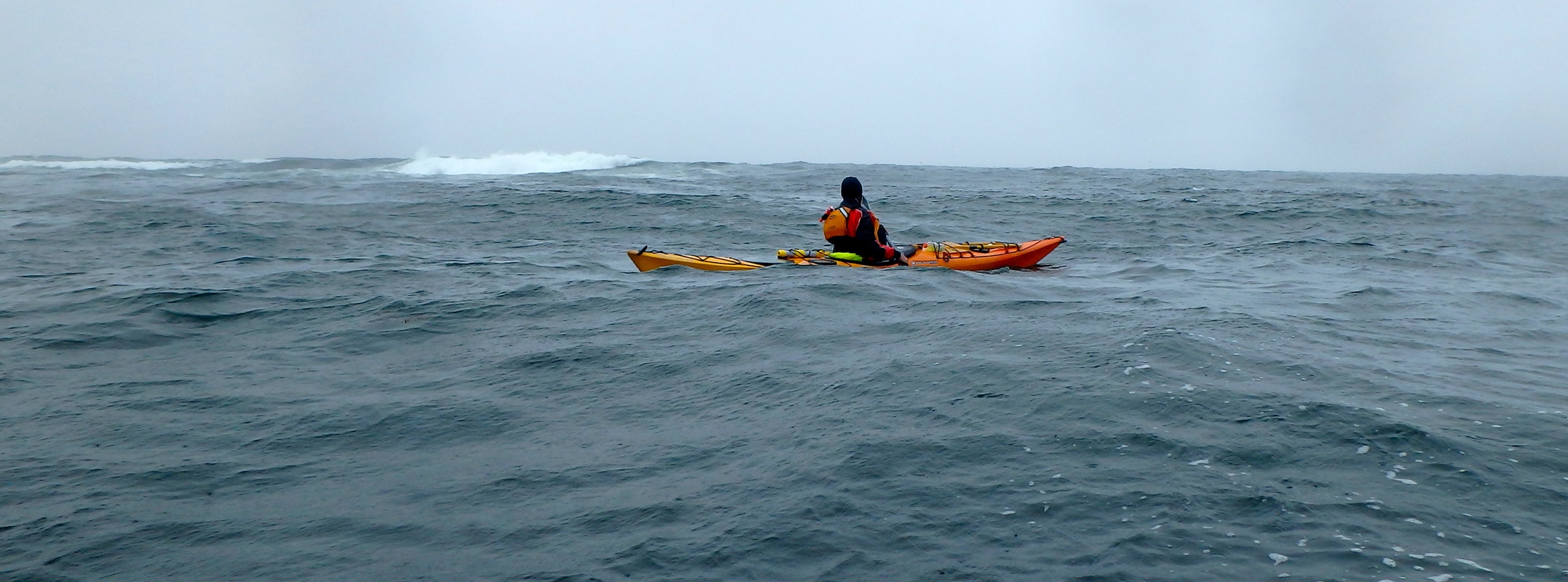 Swell breaks over McKenney Point, Photo: Joe Guglielmetti