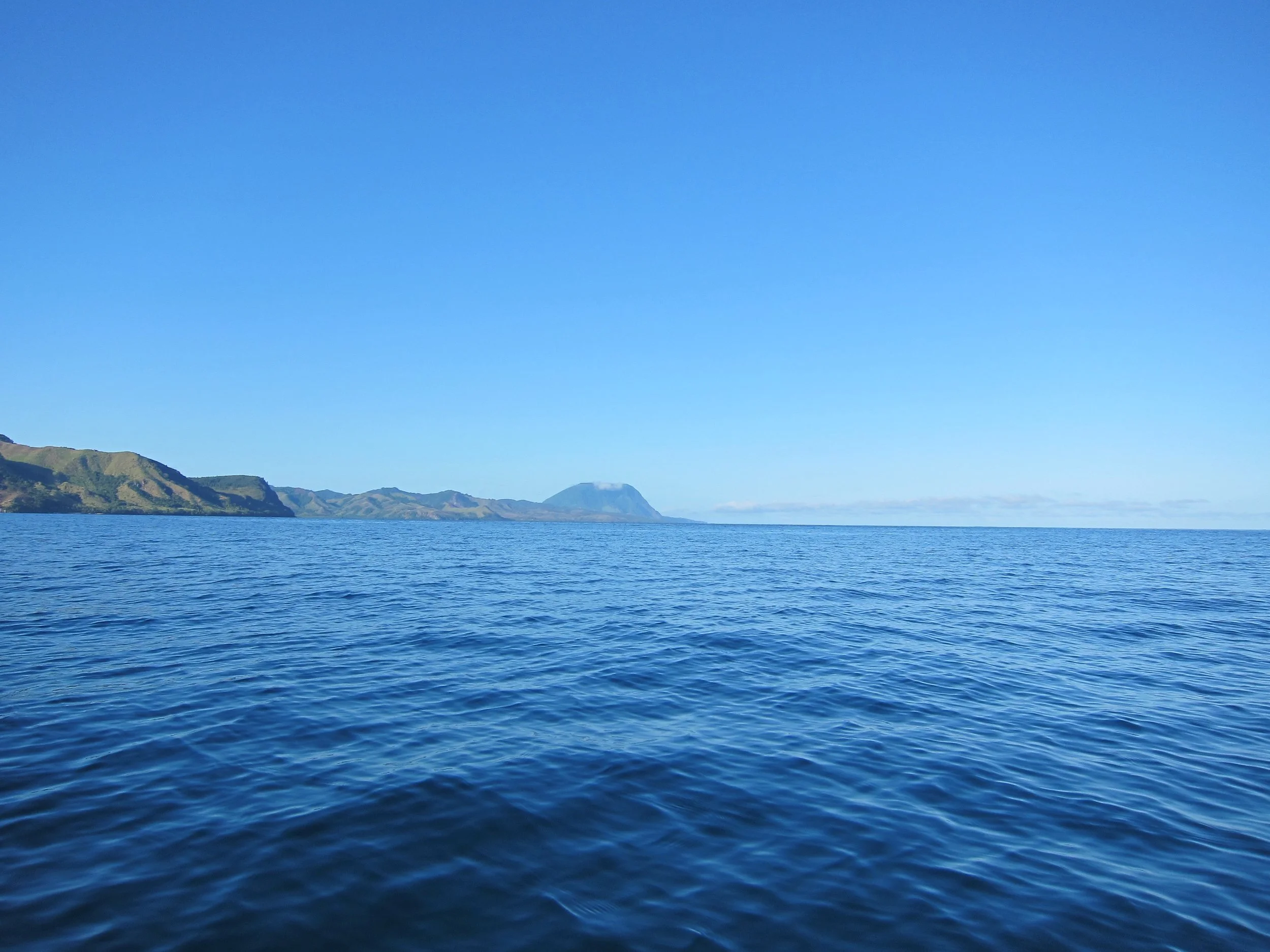 74 Looking back at Mount Washington, now visible, while departing Vunisea Harbor.jpg