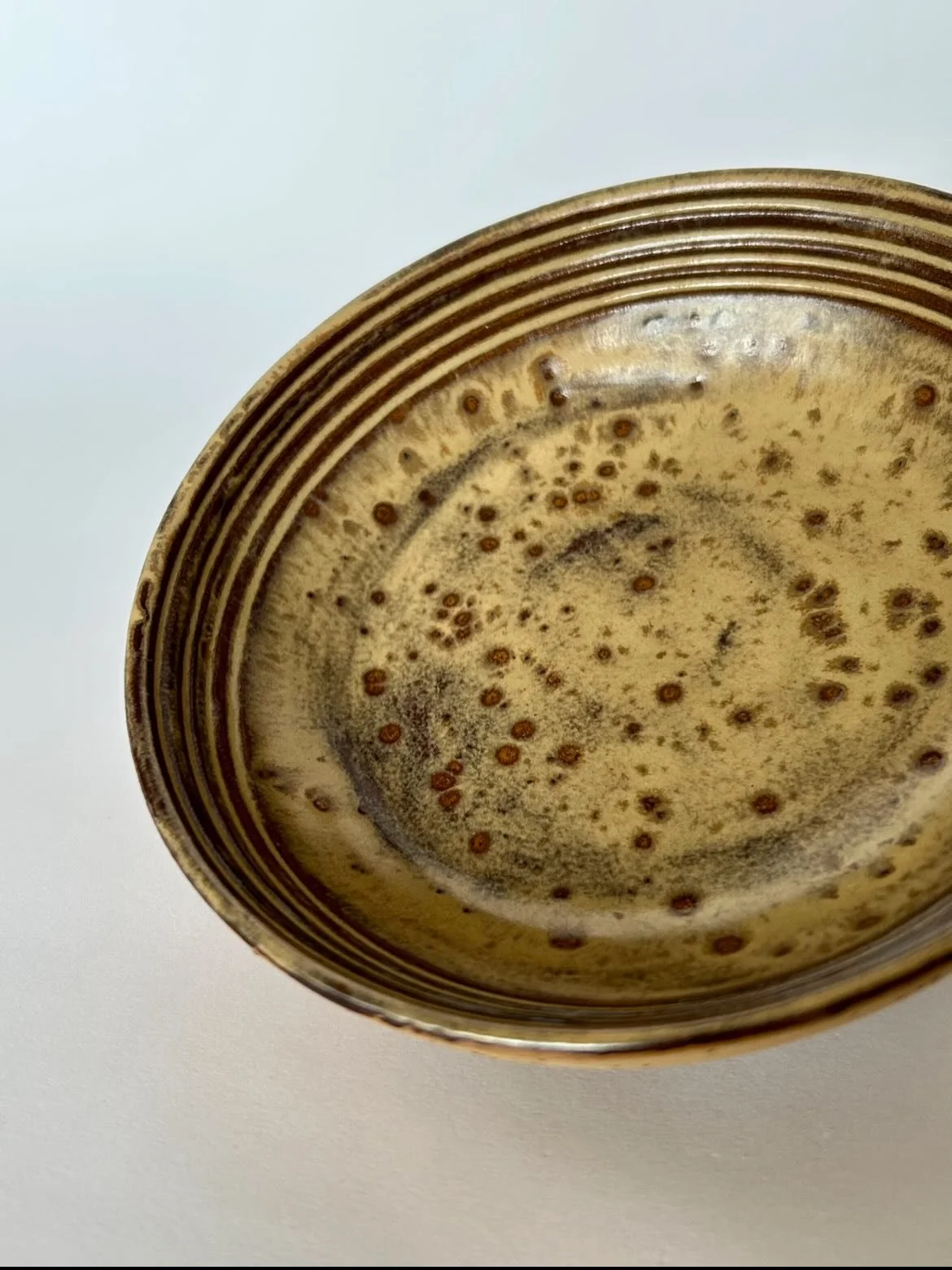 Ringing in the new year with a little snack bowl 🥜

Thank you to everyone who supported my small business in 2025. I&rsquo;m looking forward to a great year ahead! 

#wheelthrowing #wheelthrownceramics #potterylove #ceramicstudio #spectrumglazes