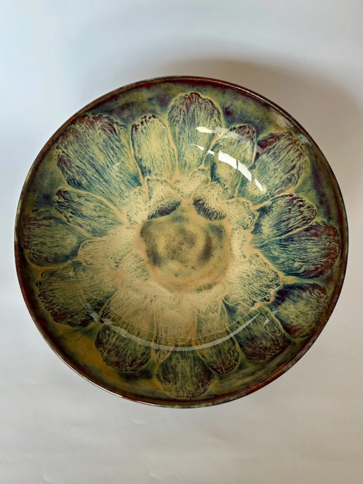 A nice wide bowl using the &ldquo;frozen pond&rdquo; technique. Loving the drippy vibes. 

#ceramicstudio #functionalpottery #spectrumglazes #potteryshop #ceramicartist