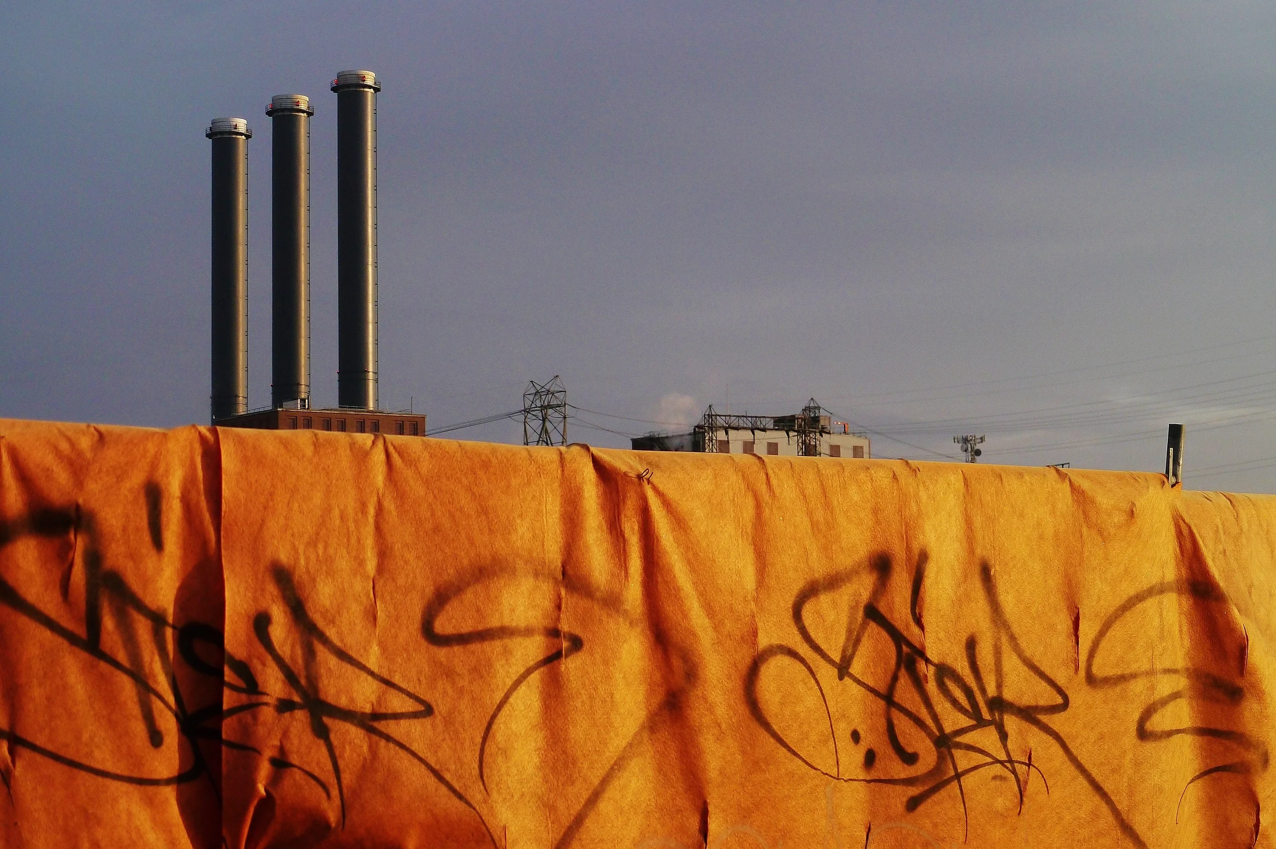 Smoke Stacks Behind the Curtain