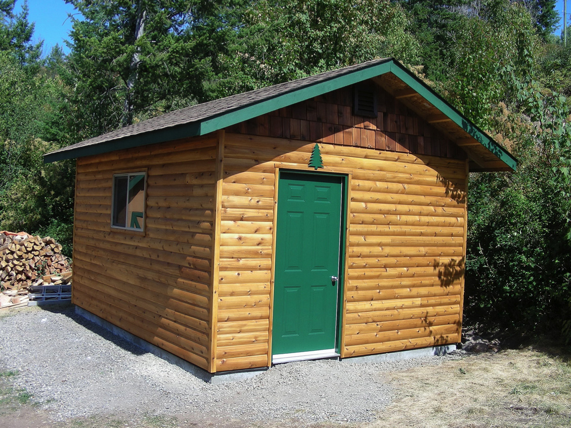  Storage shed constructed with RB 5/4x6” log siding 