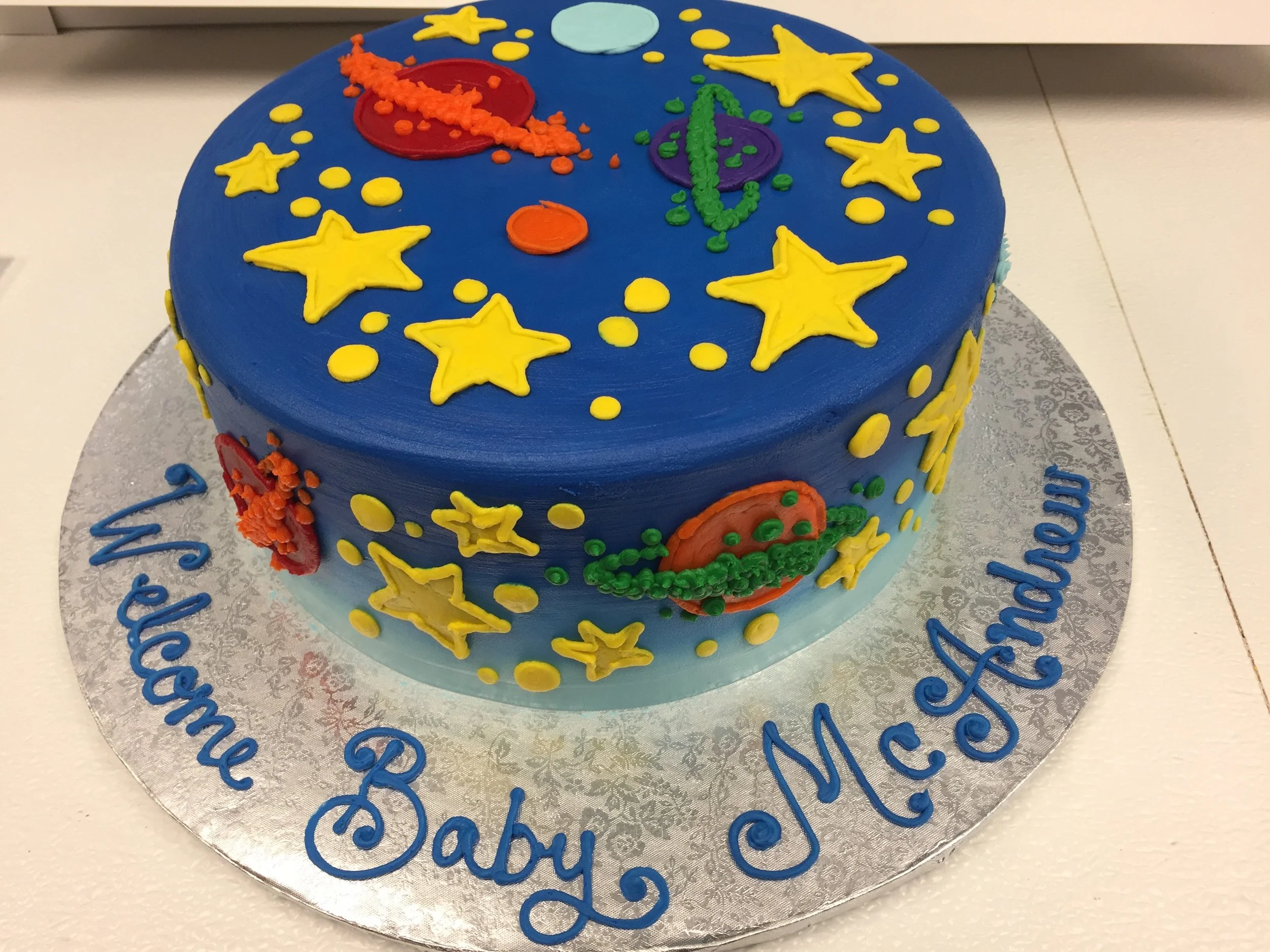 space themed baby shower cake