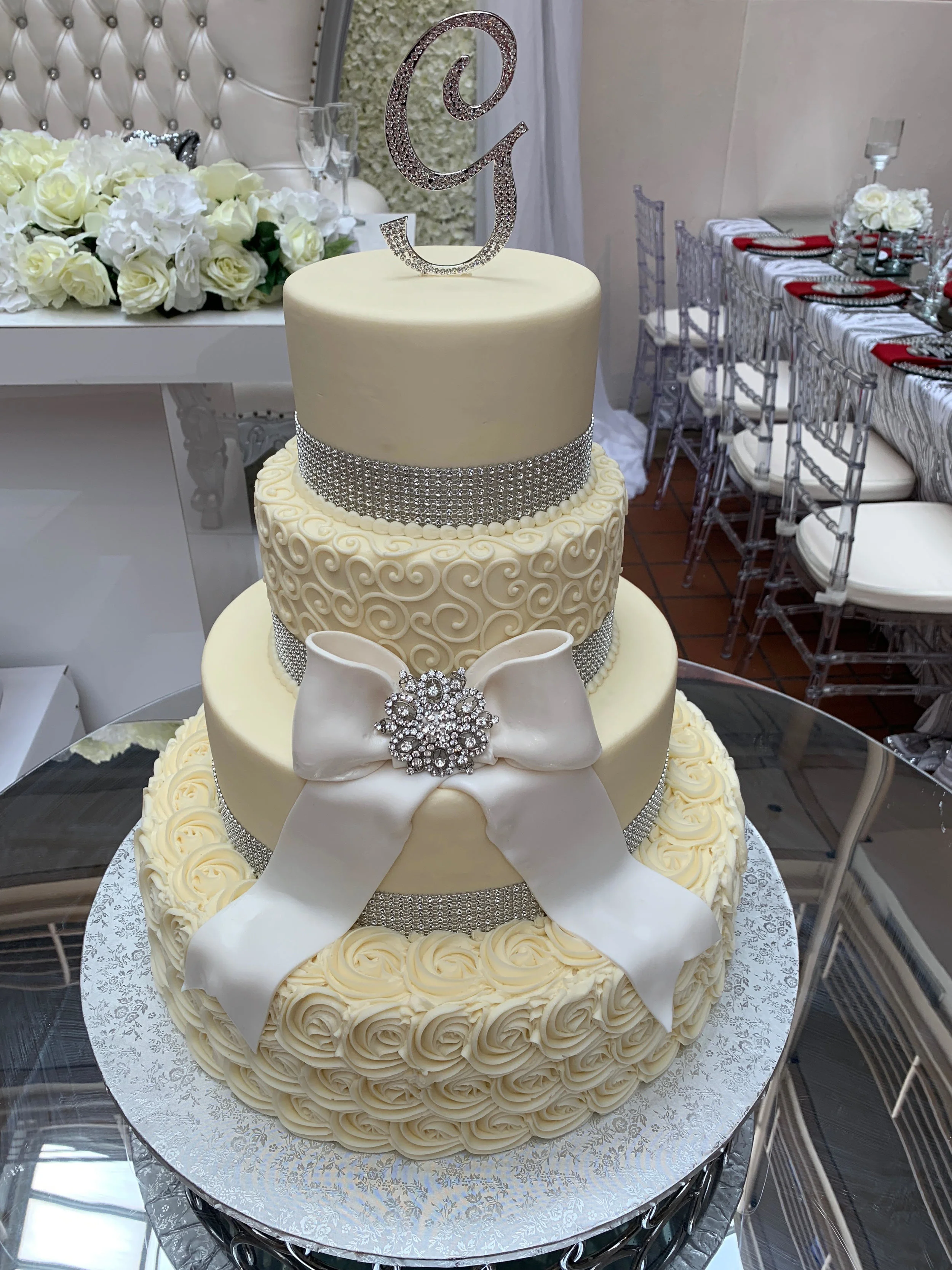 Silver Broach and Ribbon for a Wedding Cake