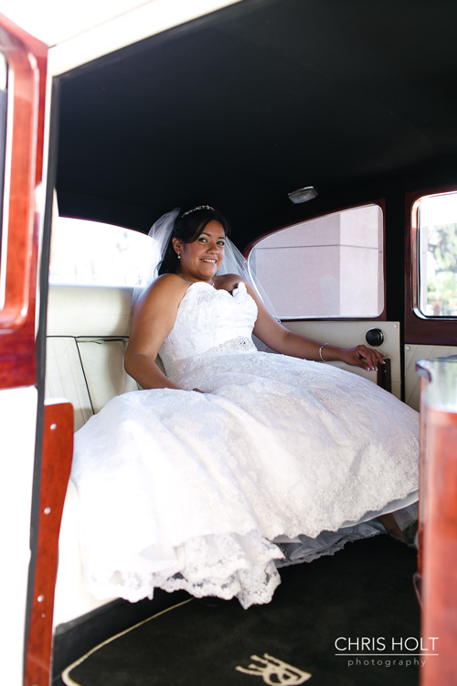wedding photo of bride in rolls royce