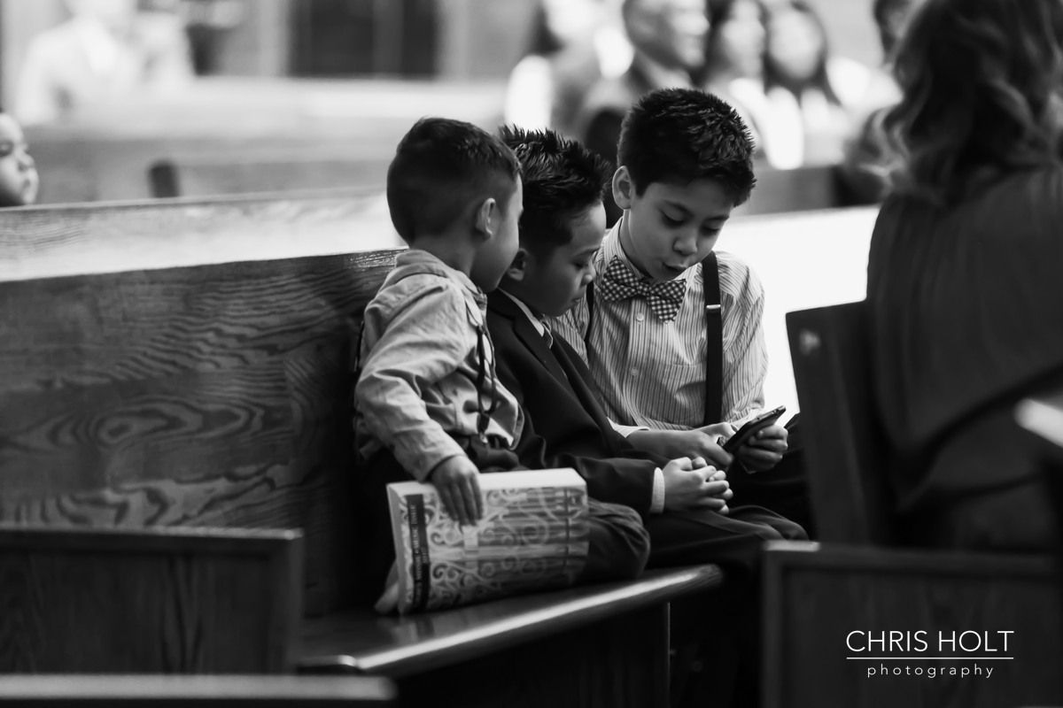 church, ceremony, catholic, priest, wedding venue, St Lorenzo, family, sponsors, cord, coins, bible, unity candle, altar, cross, husband, wife, candids, kids, guests, shenanigans