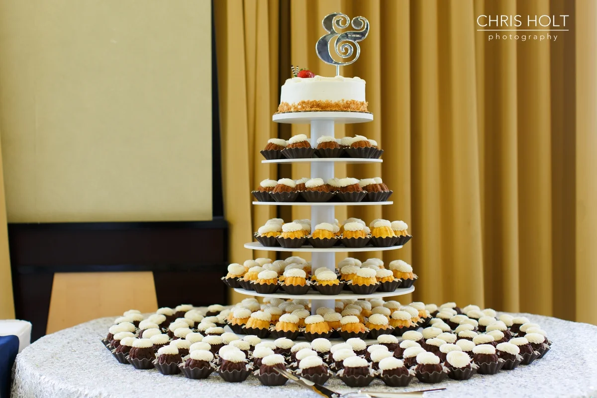 reception, venue, ballroom, centerpieces, love, resort, cake, cupcakes, bundt, florals, dance floor, backdrop, formal photo