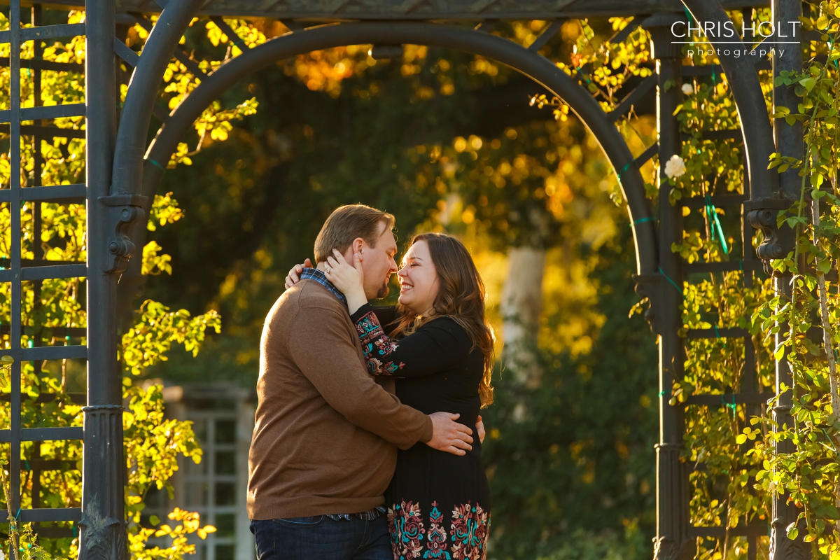 descanso gardens, floral, engagement session, reflection, trellis, gazebo, backlight, sunlight, sunset, couple, romantic, portraits, garden, happy, love
