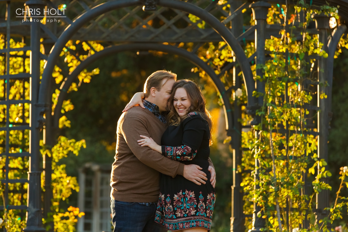 descanso gardens, floral, engagement session, reflection, trellis, gazebo, backlight, sunlight, sunset, couple, romantic, portraits, garden, happy, love