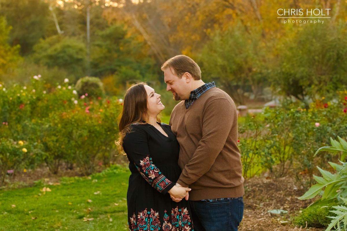 descanso gardens, floral, engagement session, reflection, trellis, gazebo, backlight, sunlight, sunset, couple, romantic, portraits, garden, happy, love