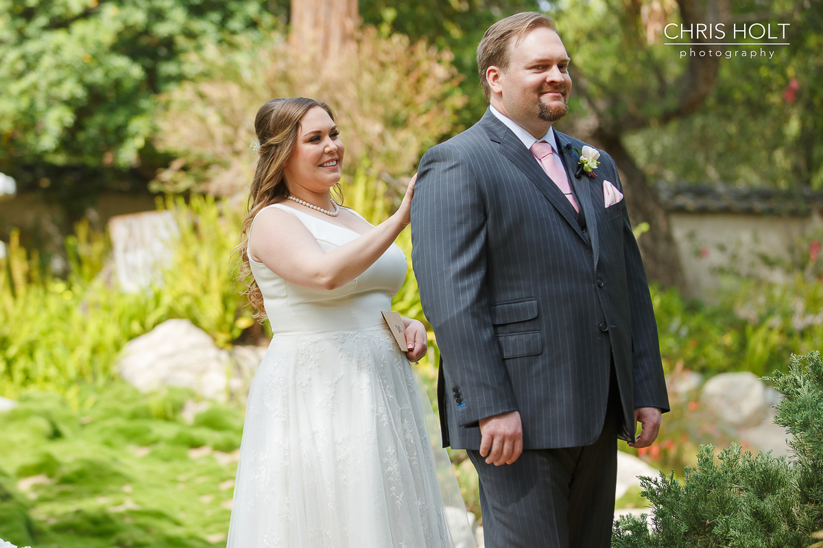  Bride taps Groom on shoulder for First Look 