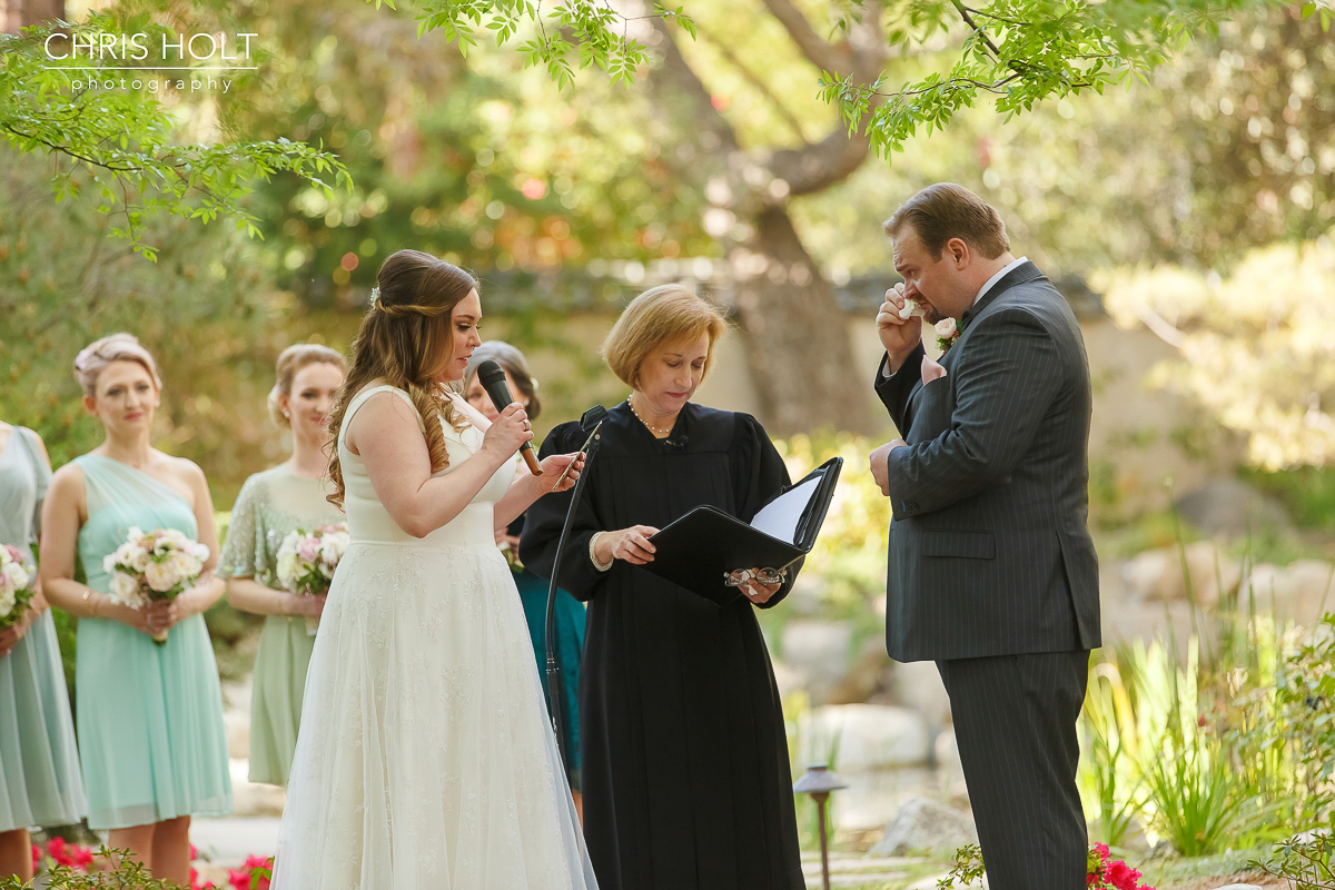  Bride and Groom exchange wedding vows at Storrier-Stearns Japanese Garden 