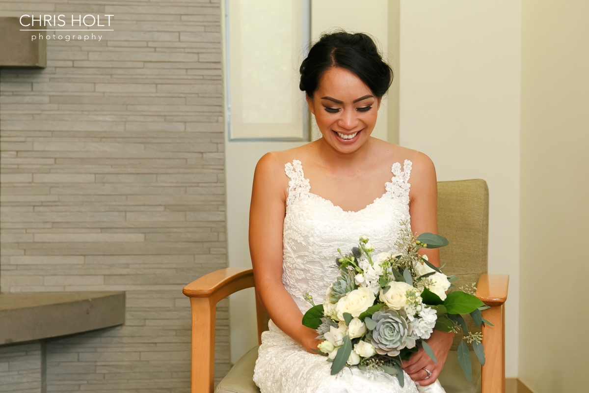 bride with bouquet before her ceremony