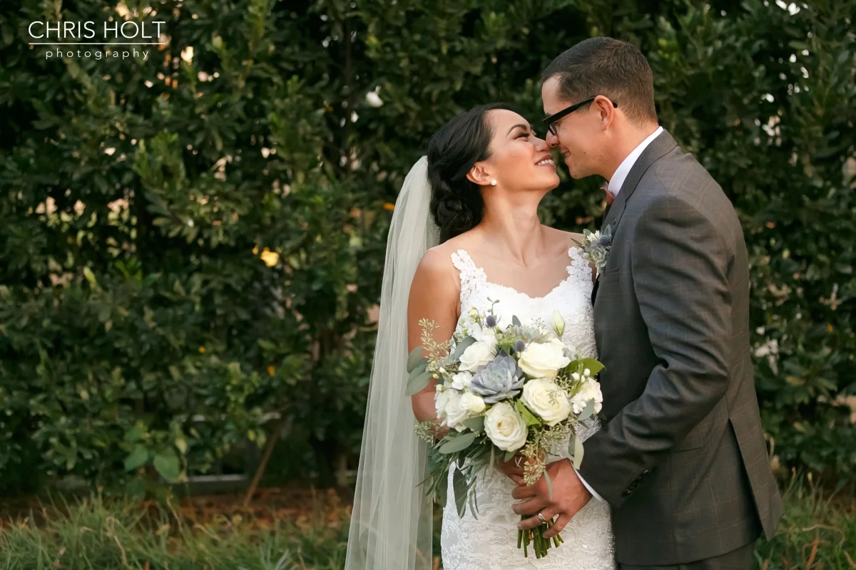 bride and groom loving each other after their ceremony