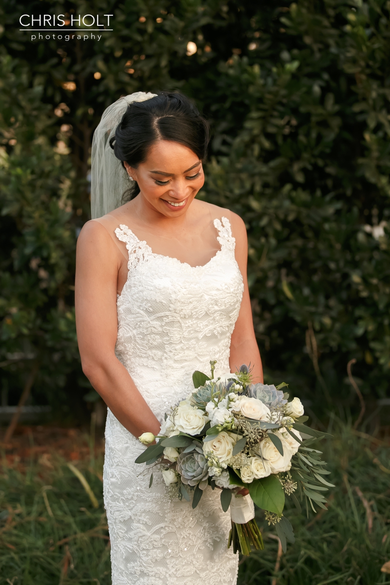 bridal portrait with her bouquet