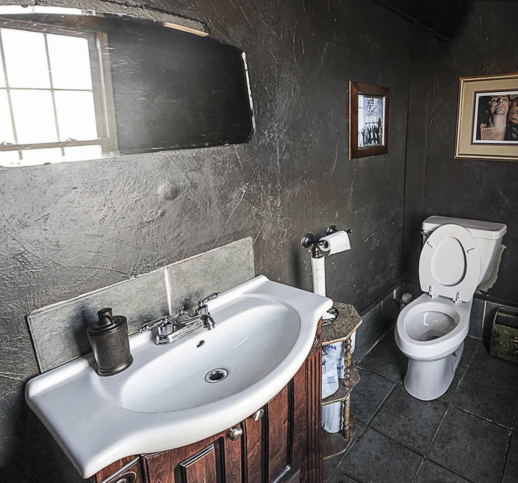 The pleasantly scented men's room of Paschall Bar. 
