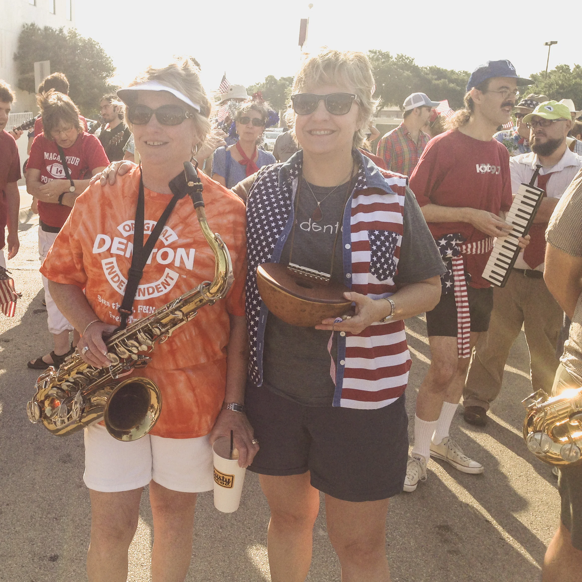 Several gathered, instruments in hand, to hang out before marching and playing wonderful cacophonous&nbsp;music together.&nbsp;