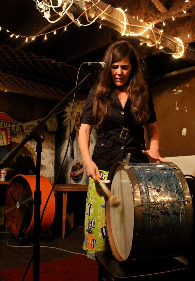 Jenny Seman of Shiny Around the Edges playing a Spiderweb Salon showcase at J and J's Pizza. 