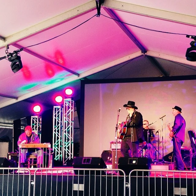 Cornell Hurd Band performing at the Thin Line tent. Photo from Paige Gibson .
