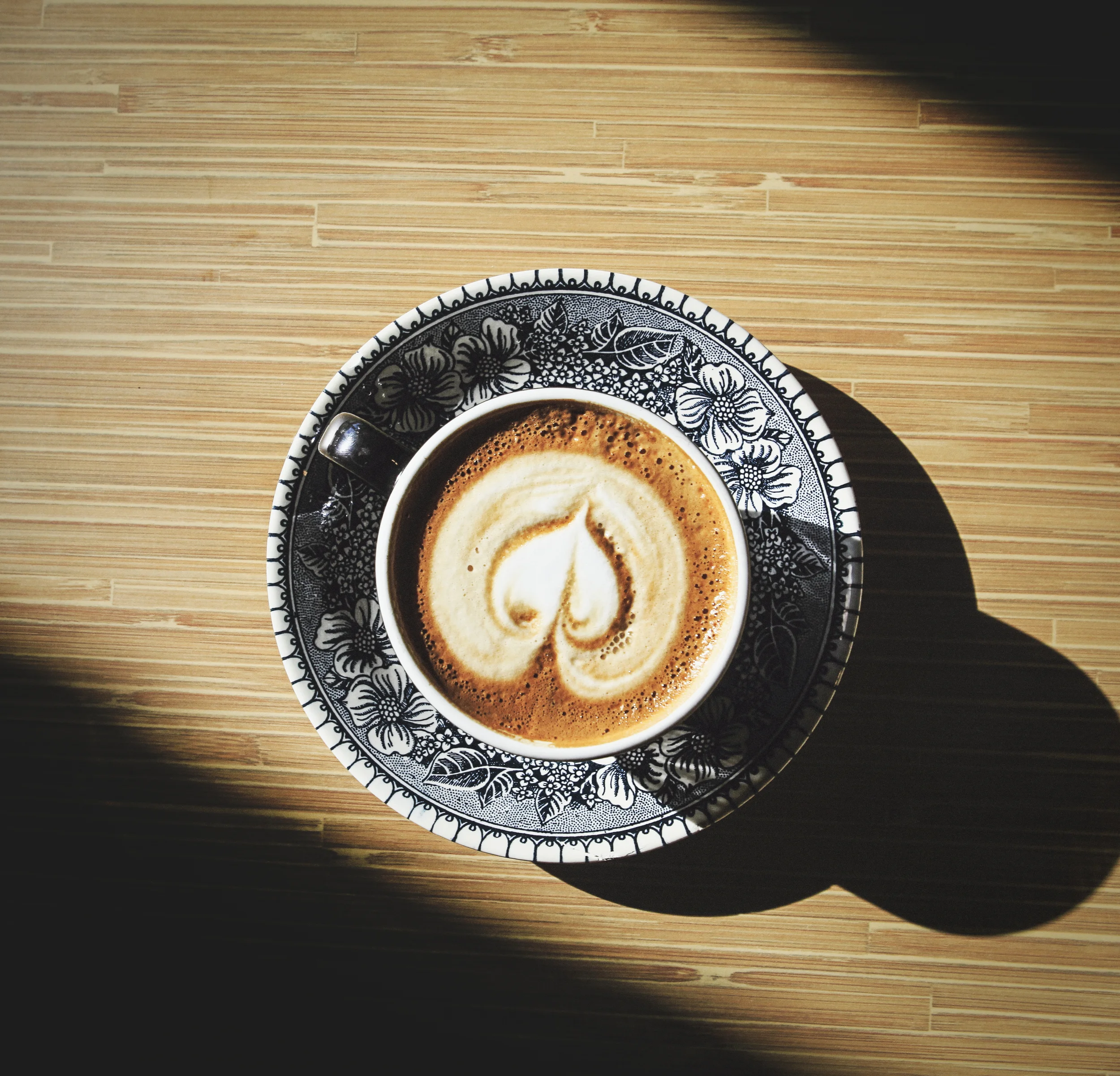 Shift Coffee reopened on Friday. We'll have more on that later. For now, enjoy this latte shot. We're calling it "A study of foam and shadows." 