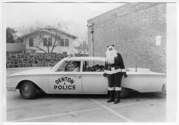 Denton Sheriff Andy Anderson hunted monsters AND helped out Santa. True story. Photo courtesy of UNT Libraries