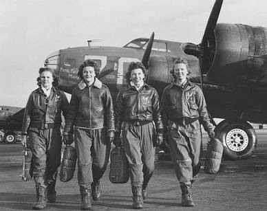 Members of the Women Air Force Service Pilots: from left Frances Green, Margaret Kirchner, Ann Currier and Blanche Bross walk in front of a B-17 plane called a “Pistol Packin’ Mama” after training at Lockbourne AAB in Columbus, Ohio. Photo courtesy of the TWU archives and the Denton Record Chronicle .