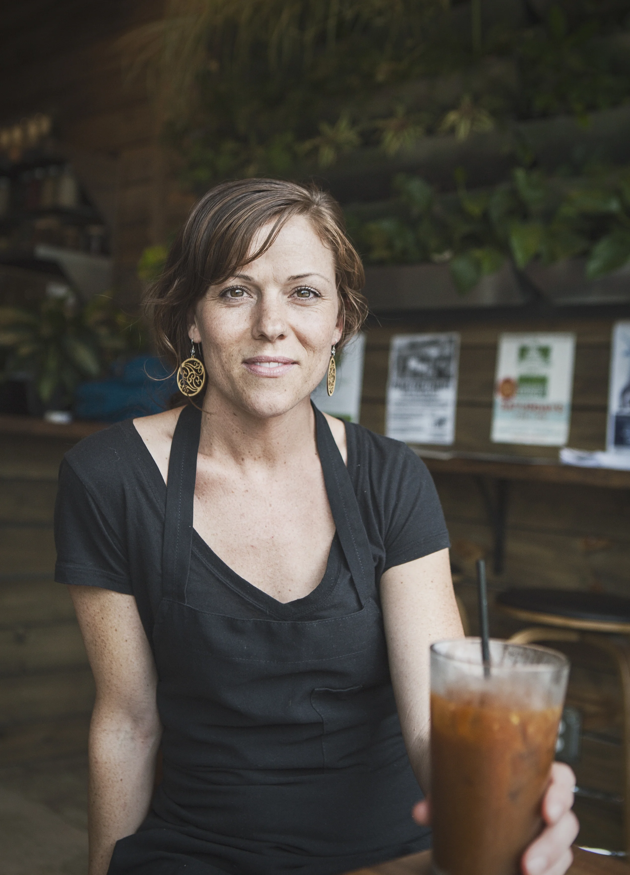 Harvest House Cafe Manager, Andie Sterling, and some cold brew. Photo by Will Milne.