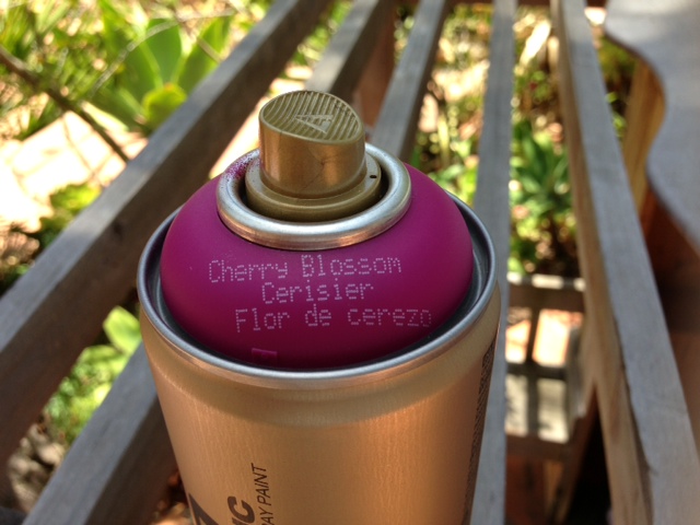 montana spray paint in cherry blossom. if you're spraying plastic, go with the gold can as it has less of a forceful output and "sticks" better. 