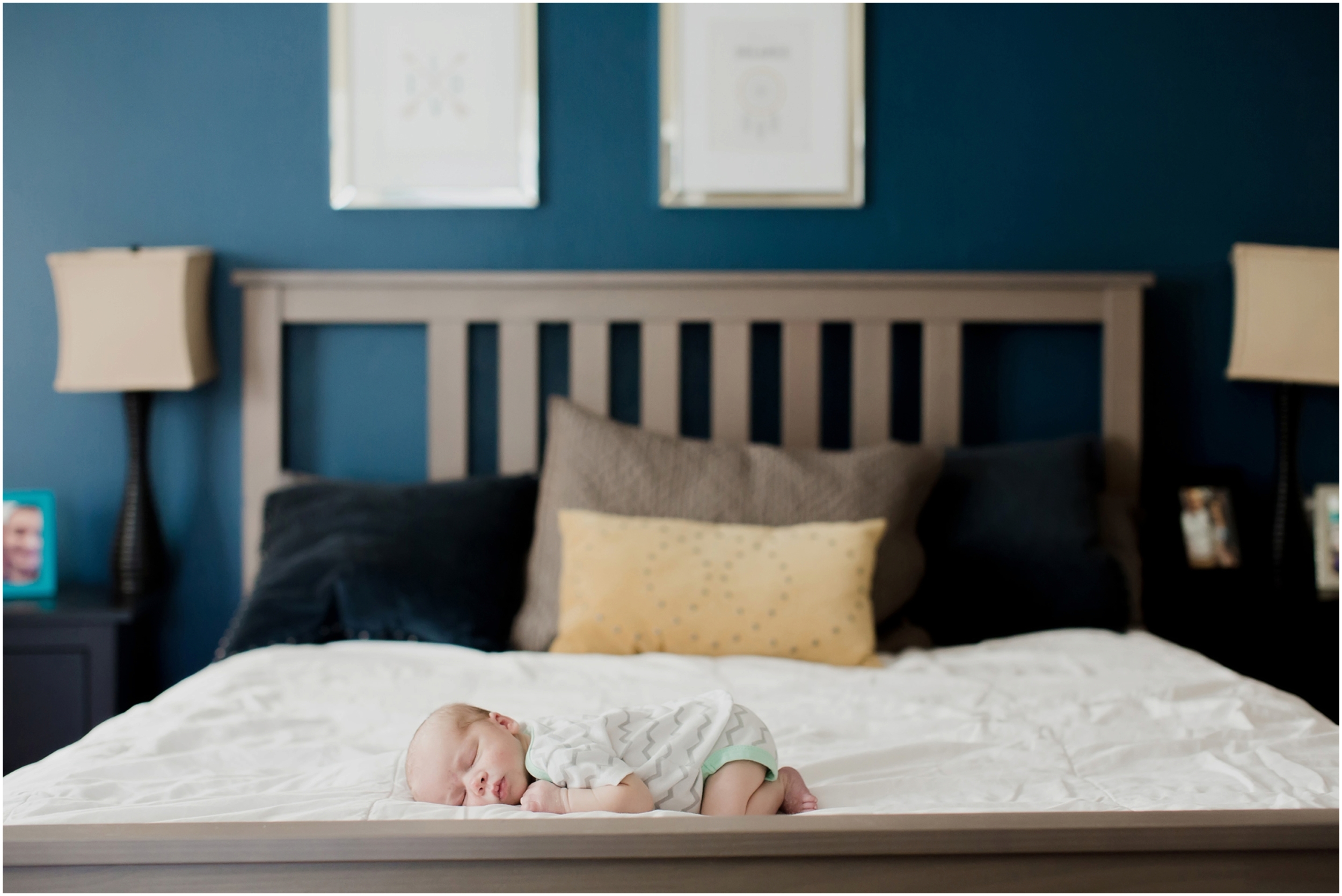 newborn-baby-on-parents-bed