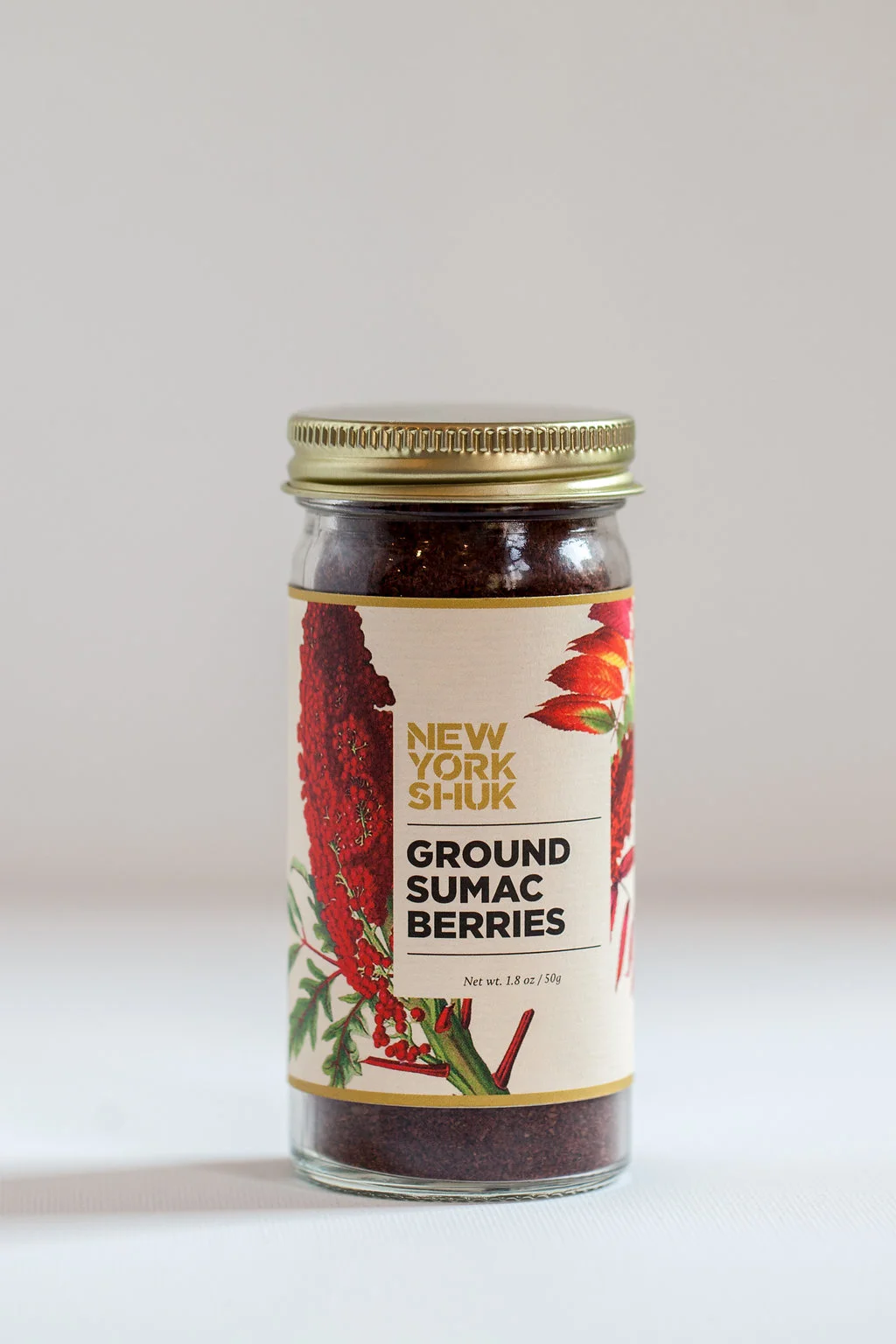 New York Shuk Ground Sumac Berries White Background