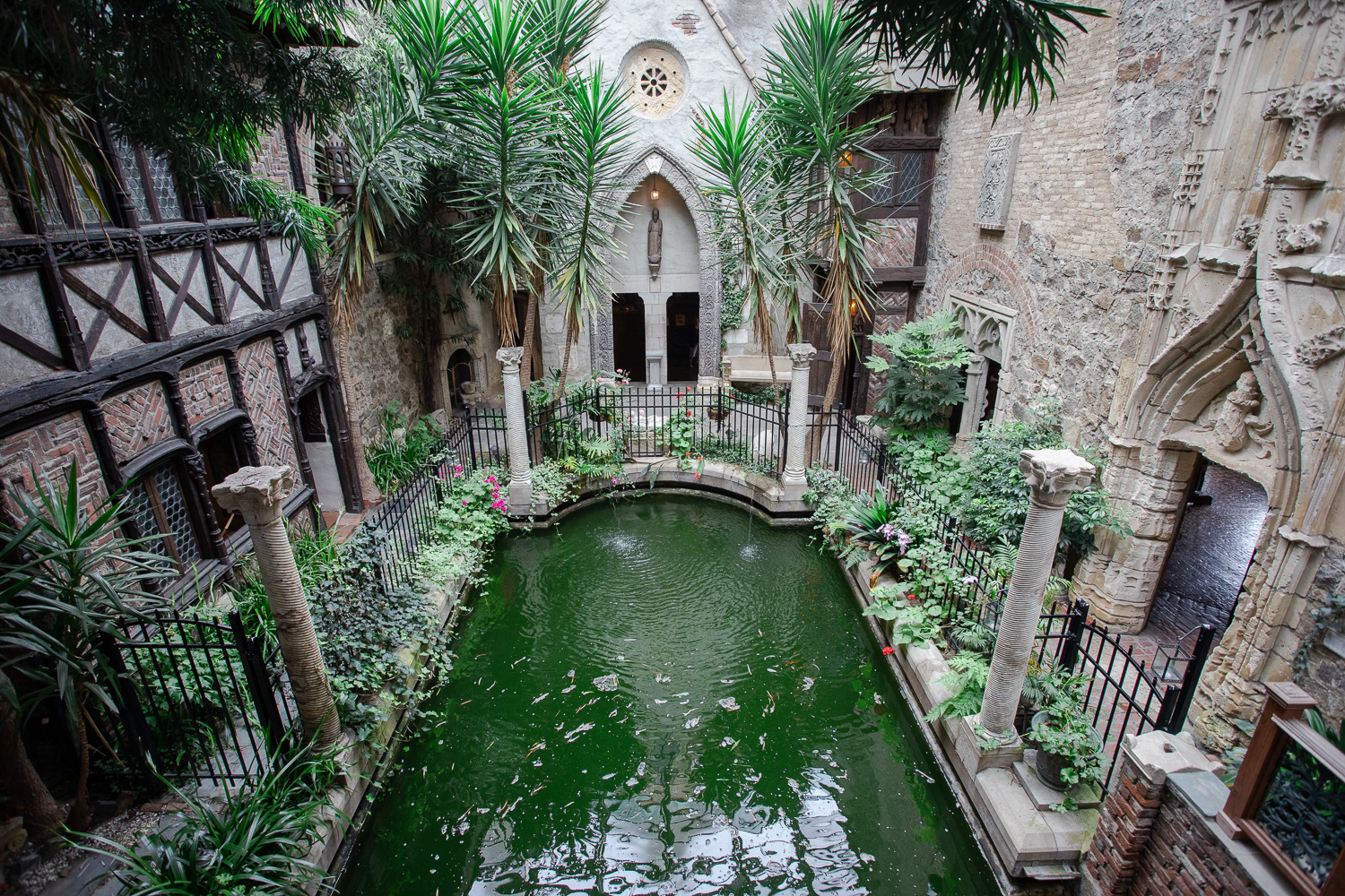 The view of the courtyard and pool from the second story ledge.