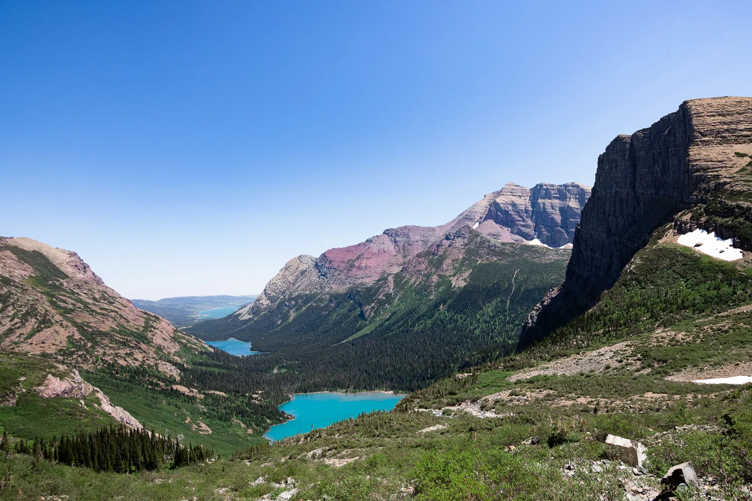 A view of Grinnell Lake, Lake Josephine, and Swiftcurrent Lake from the Grinnell Glacier trail.