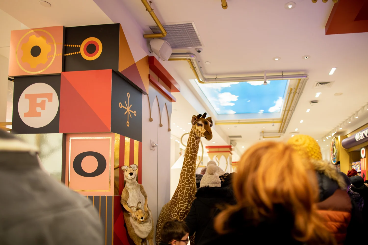 Walking into FAO Schwarz—expect plenty of crowds!