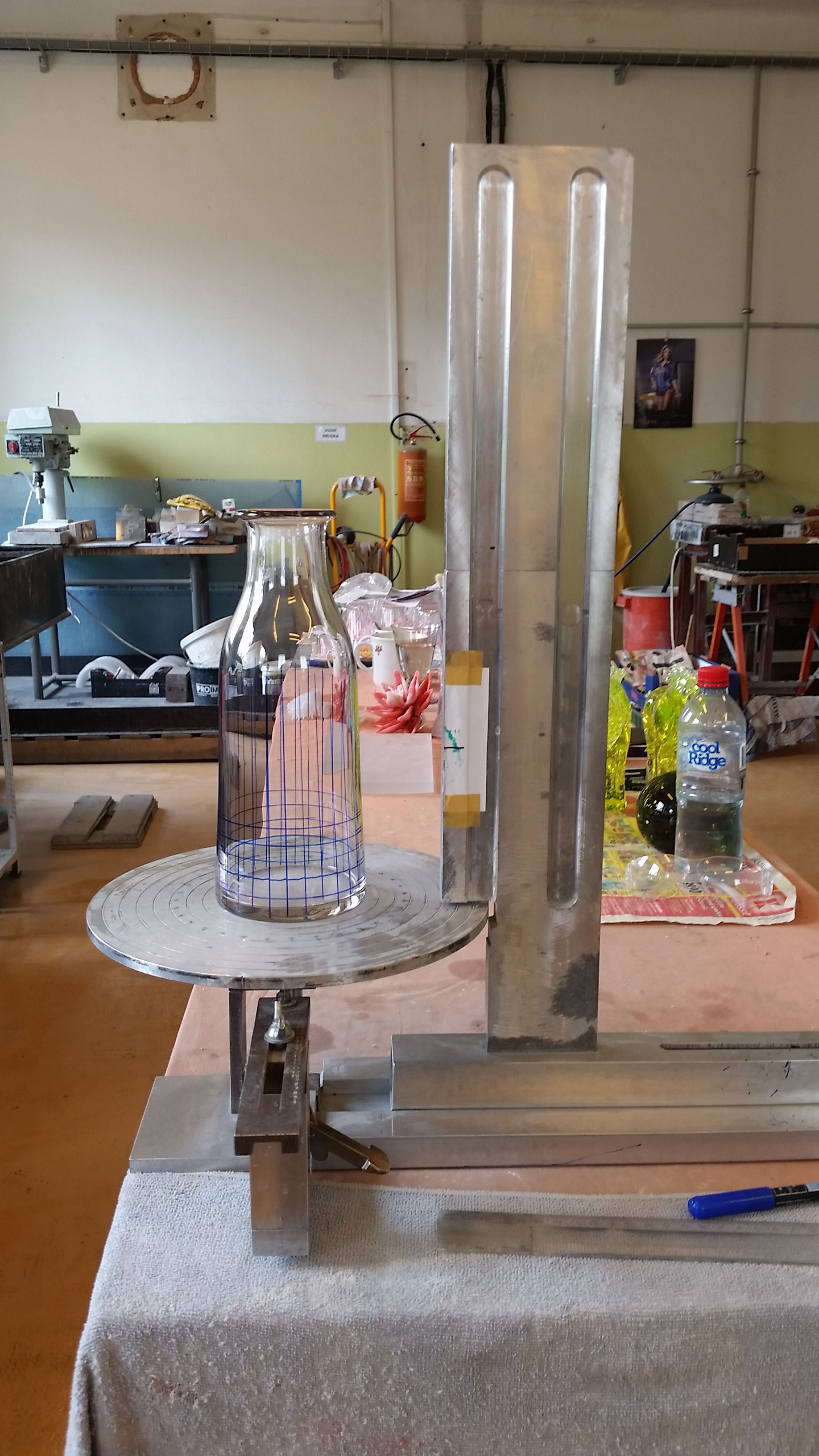 A mark making machine to prepare the glass