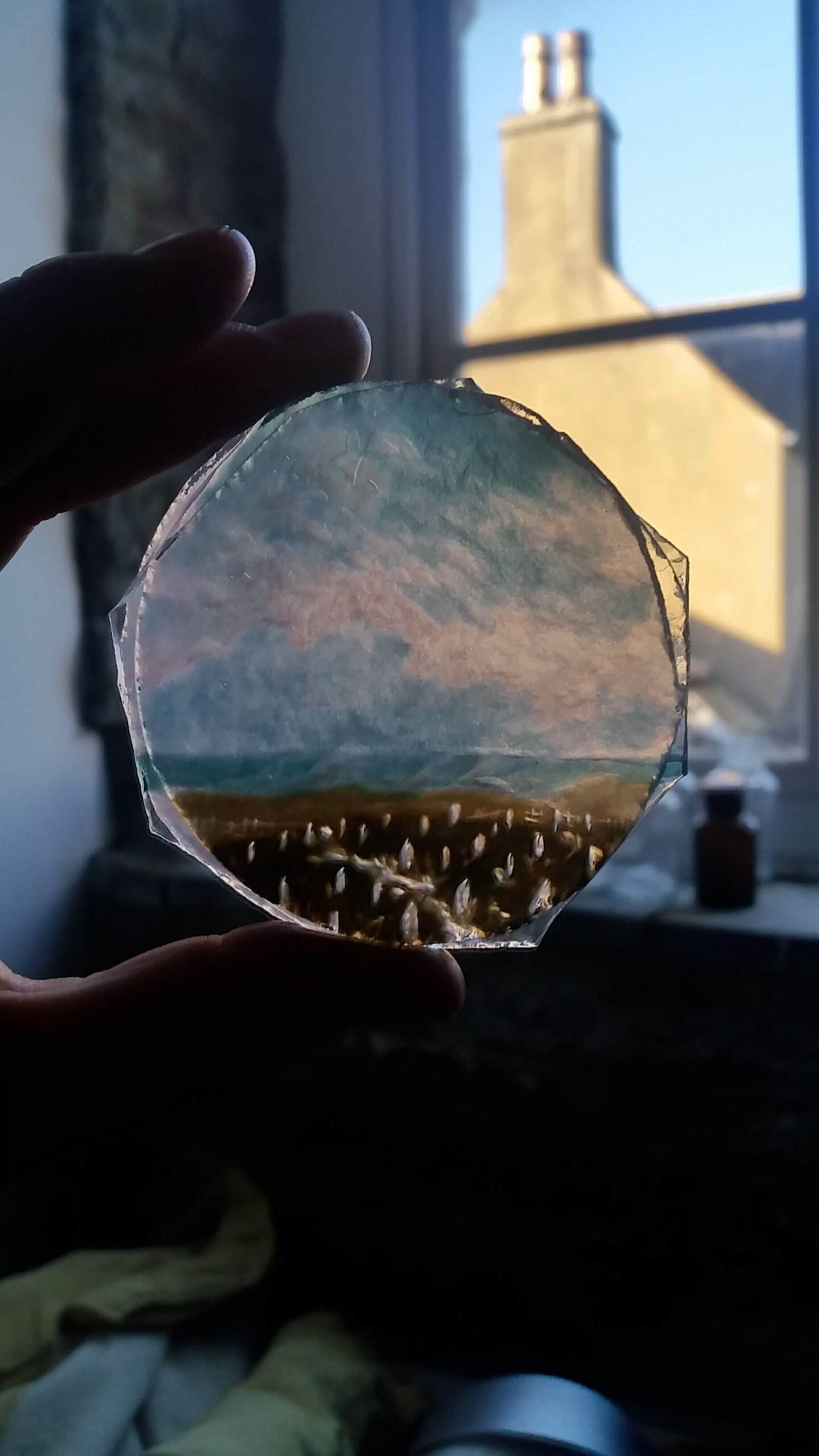 Fusing engraved sheets of glass