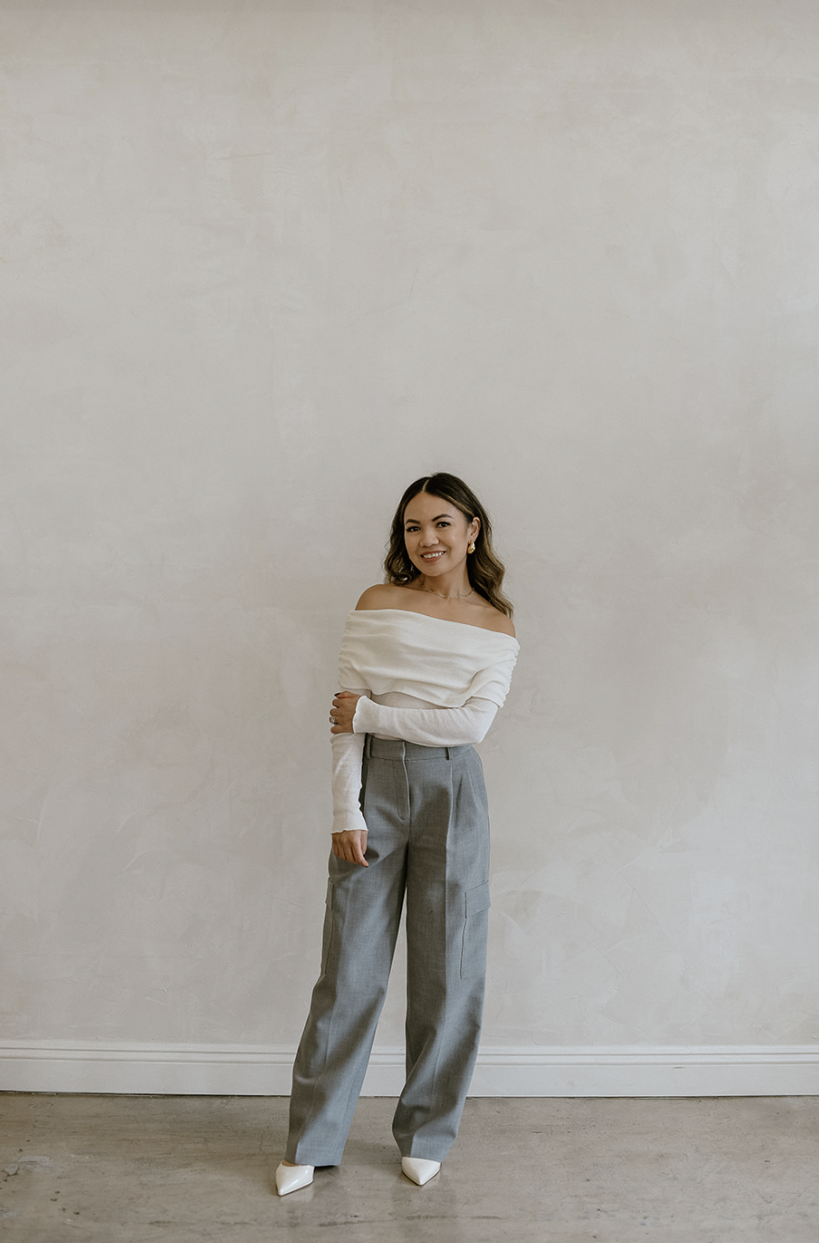 Geometric drawing of an outline square with sections divided by vertical, horizontal, and diagonal lines.