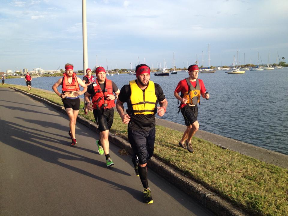 Running back to our rucks after the swim