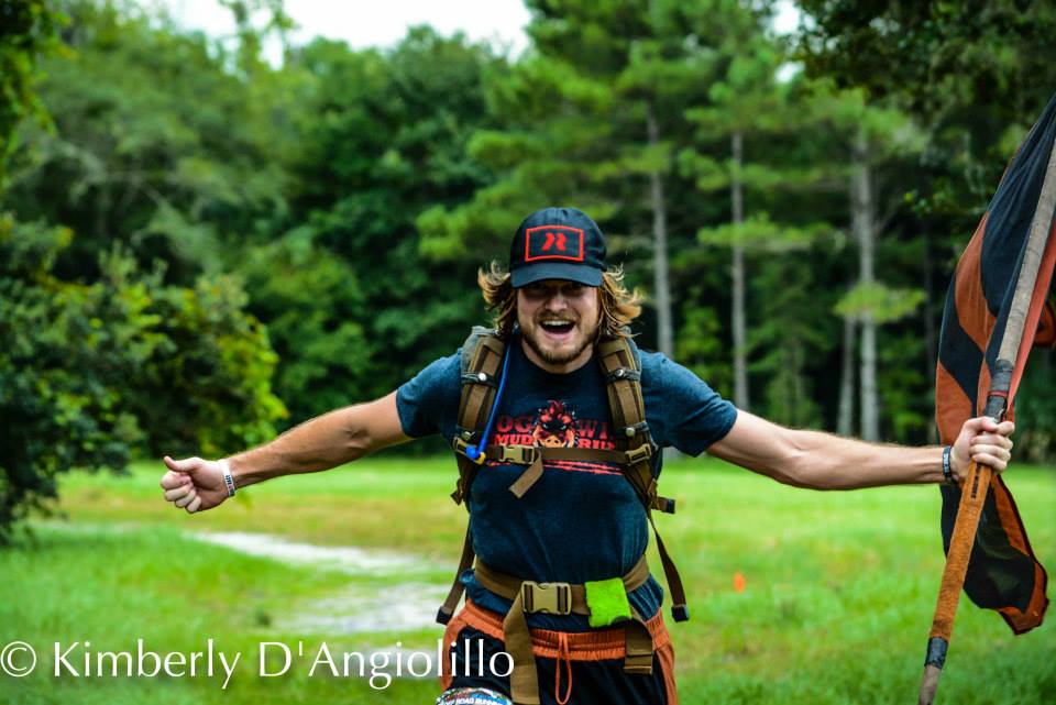 My finisher pic. Note the Ultra Beast arm band nestled on to my rucksack.