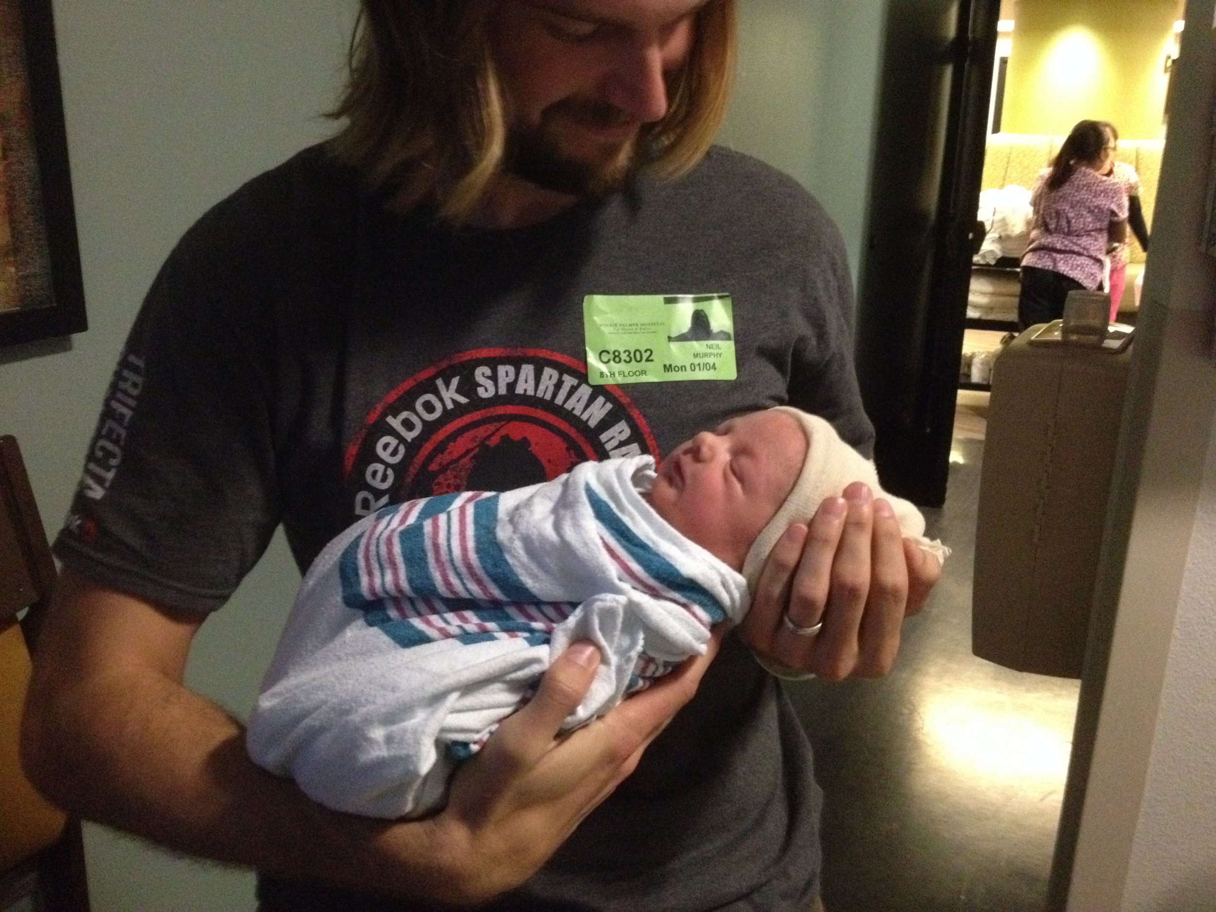 Mere moments after Alexander (Xander for short) made it into this world! Of course I'm wearing a Spartan shirt...