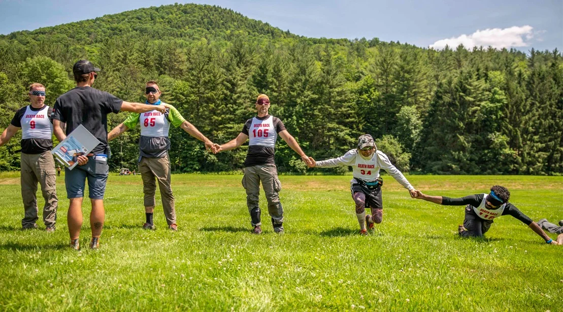 Meanwhile, those who kept their shirts got to do some blindfolded PT while holding hands Photo Credit: Amanda Suarez / M+F Magazine