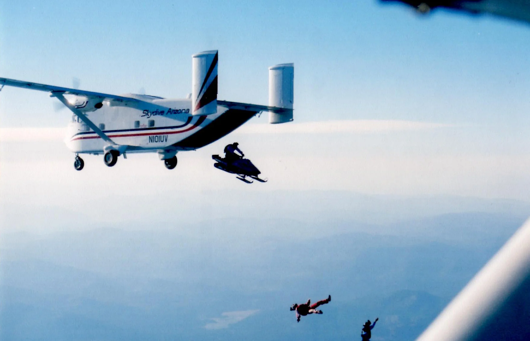 In Greg's first snowmobile movie "Mountain Mod Mania" they jumped a snowmobile out of an airplane at 13,000 feet!