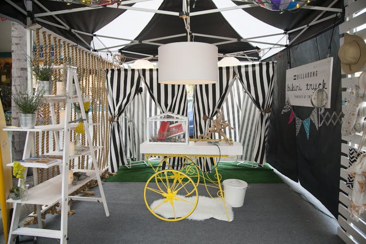  An overview of some of the exterior accessory garden. At back are the changing rooms, designed and sewn by Brewer Design.&nbsp; 