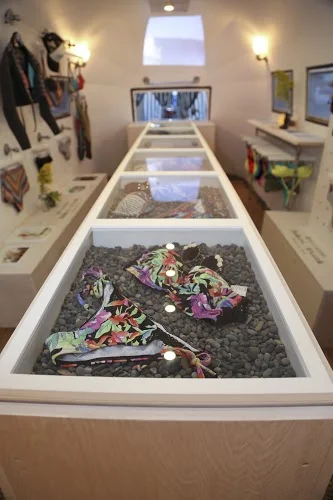  The custom-built island features shadow boxes to highlight key styles.&nbsp; 