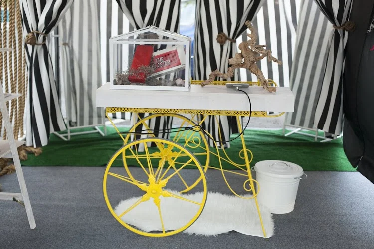  The cash wrap is vintage, custom painted with a new wood top and electrical. 